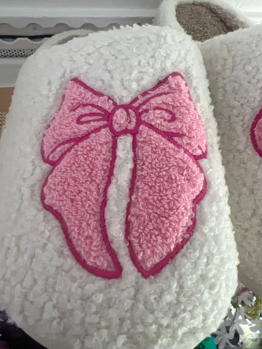 Pink bow slippers